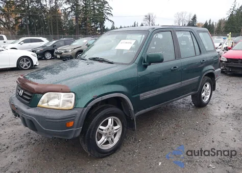 1999 Honda Cr-V Ex z USA, uszkodzony, nr VIN JHLRD1861XC080320